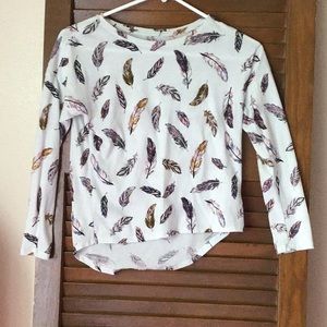 A feather long sleeve. Shirt
